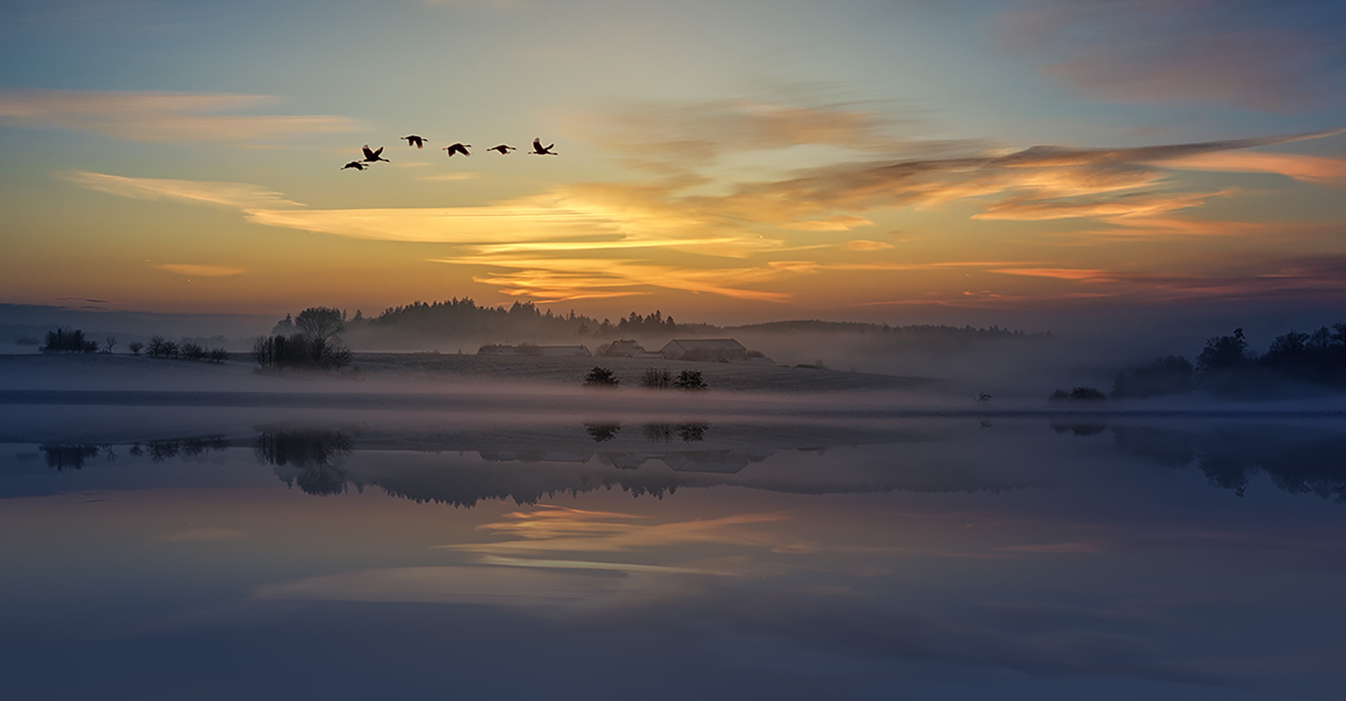 village and water photo by Johannes Plenio